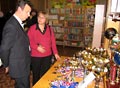 Награды за победы в шашечных турнирах, выставленные в Подюжской сельской библиотеке